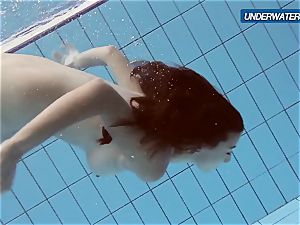 fledgling Lastova proceeds her swim