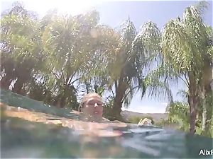 huge-titted blondes Alix and Cherie go skinny dipping